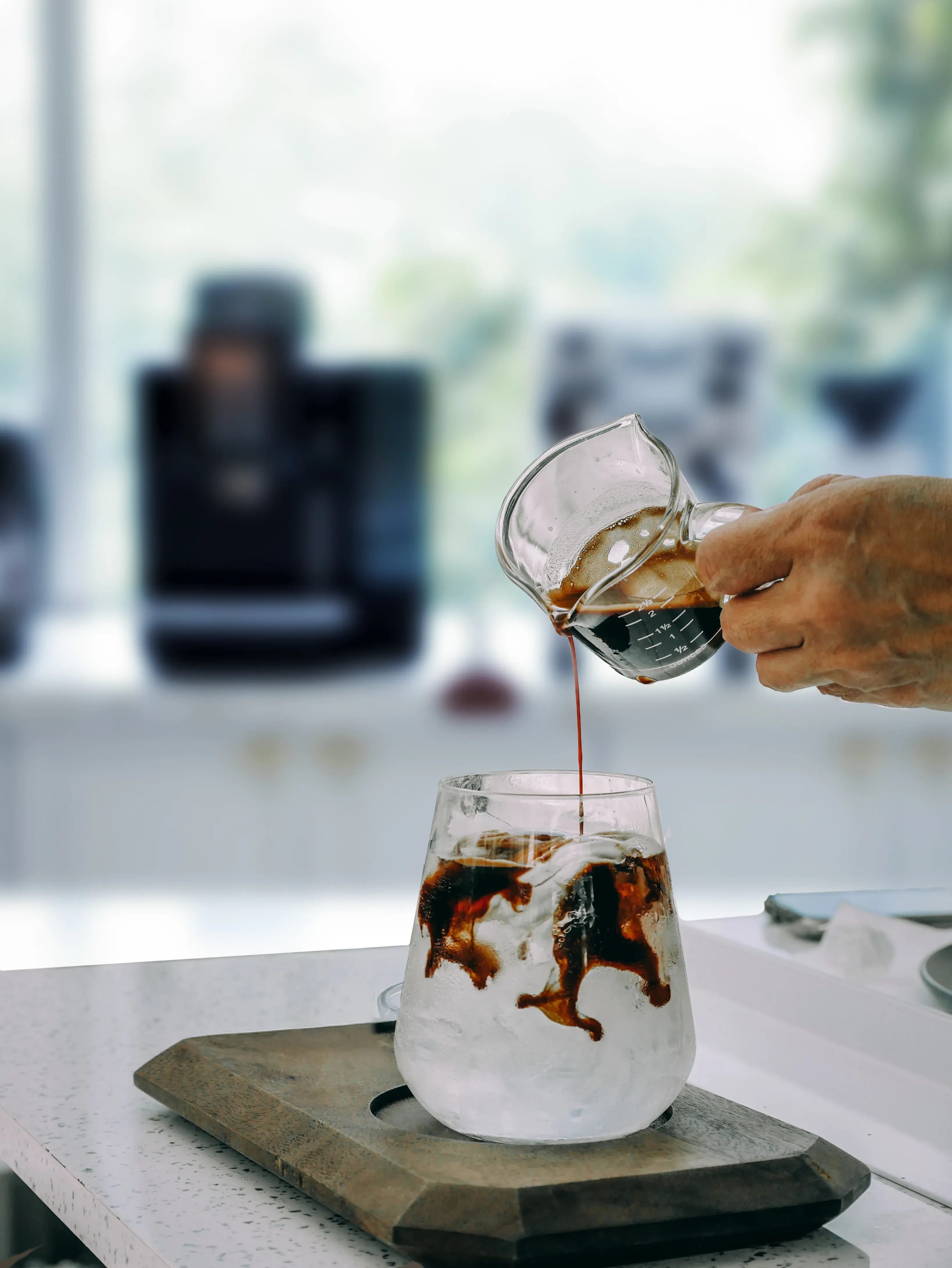 Modern corporate office breakroom with a touch-screen bean-to-cup automated coffee machine